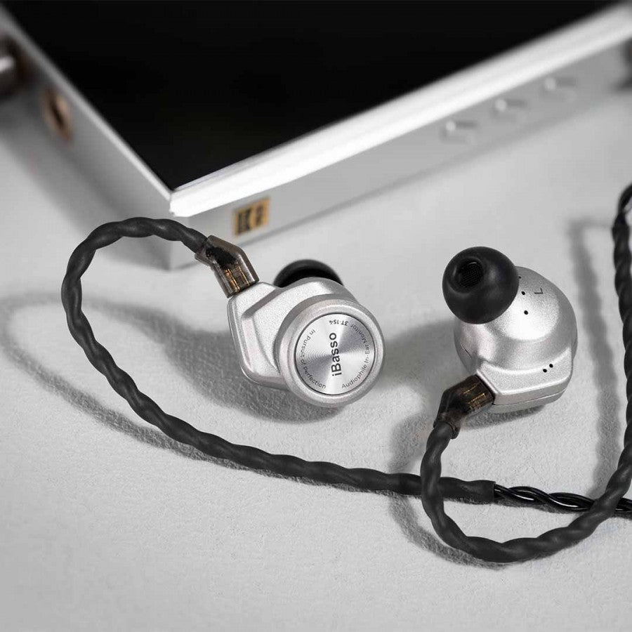 IBasso £T-154 Silver IEMs beside a iBasso DX260 Digital Audio Player